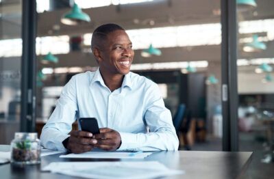A fleet manager reviews analytics from his fleet card right from his cell phone.